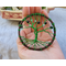size comparison tree displayed in palm of hand compact small good for small spaces
